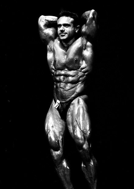 John Terilli abdominals pose on the bodybuilding stage